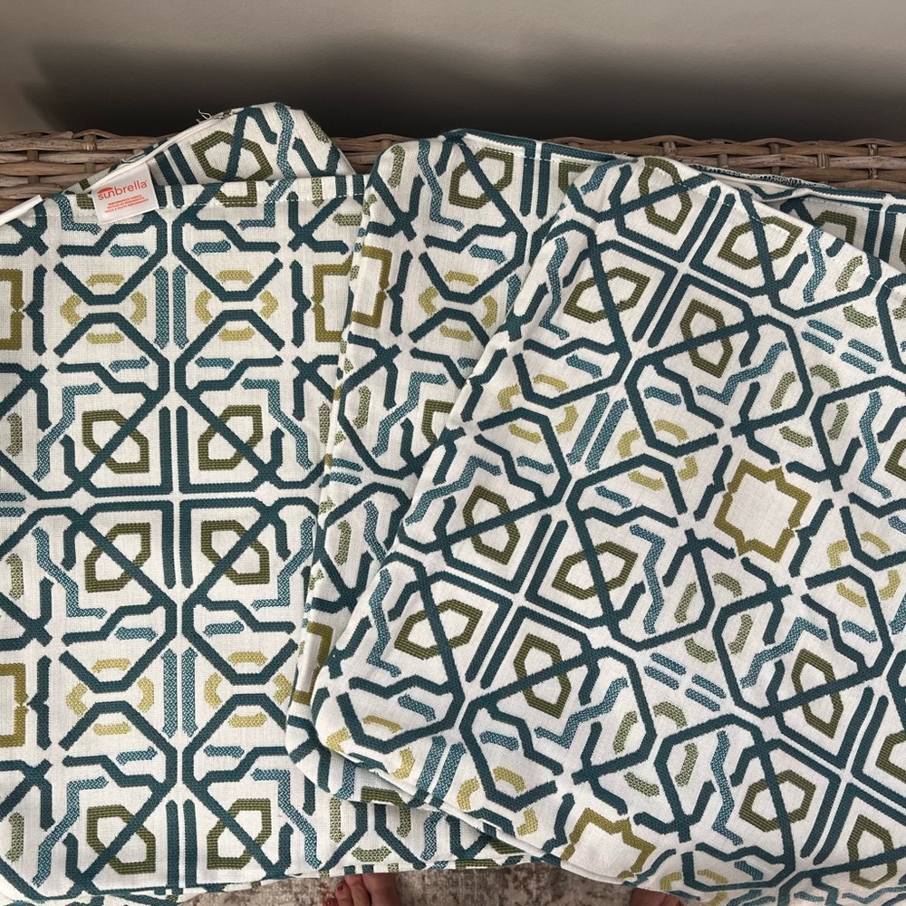 Four Sunbrella pillow case covers. 17x17